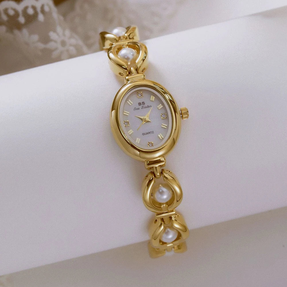Montre bracelet en perles LUMÉA avec une touche dorée