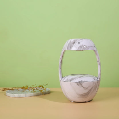 Humidificateur décoratif HUMEA avec brume anti-gravité et design en marbre