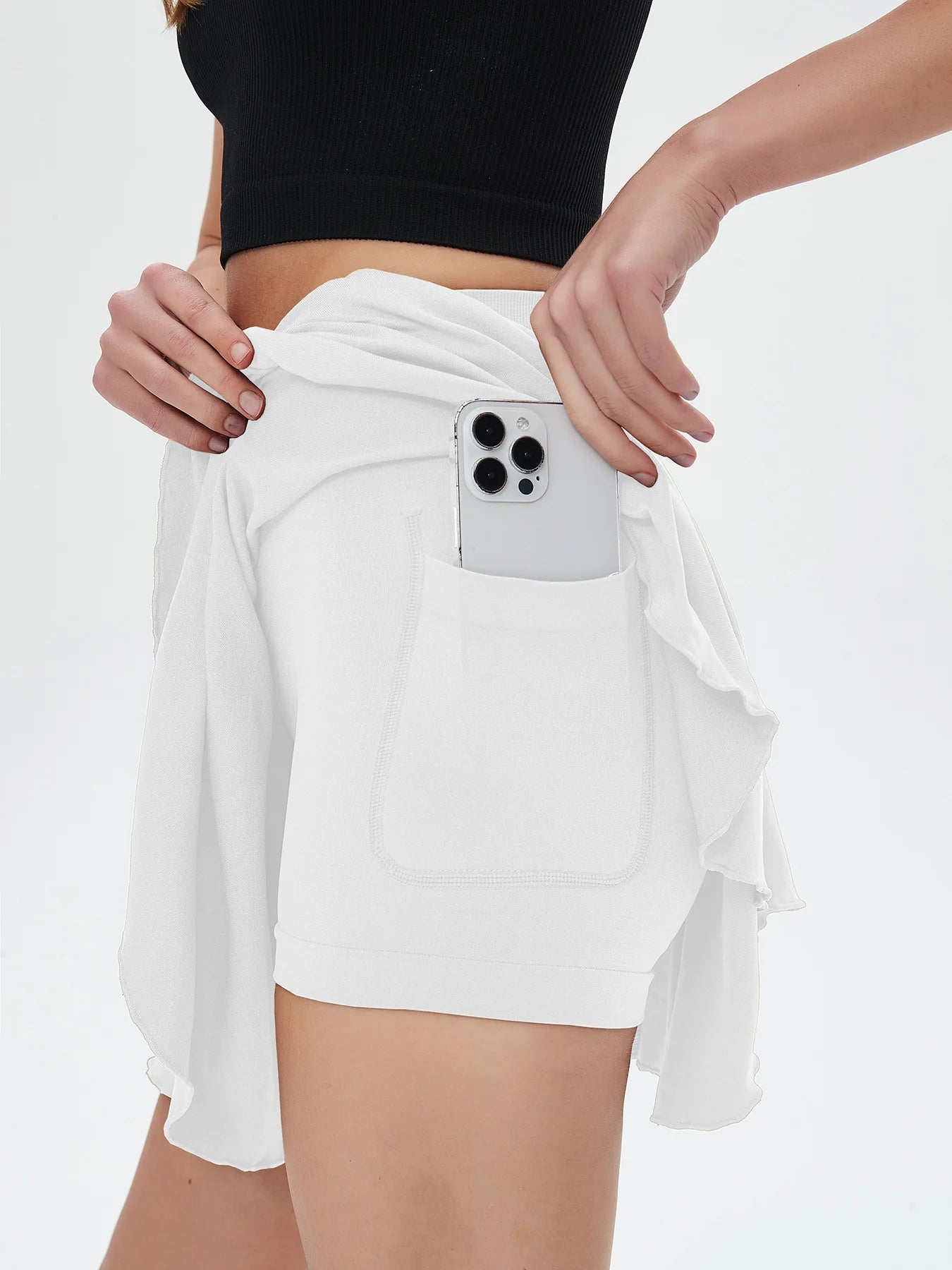 Mini-jupe de sport pour femme avec poches, taille haute et short de sécurité