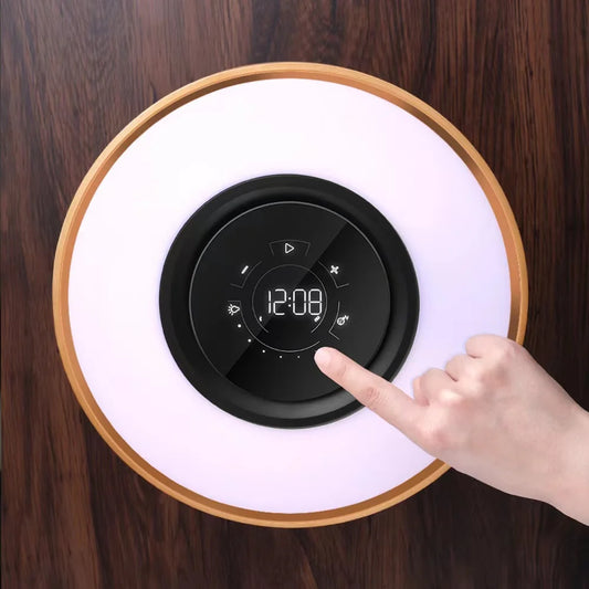 ORBITLIGHT – Lampe de bureau d'ambiance 4 en 1 avec chargement sans fil, musique et style intemporel 