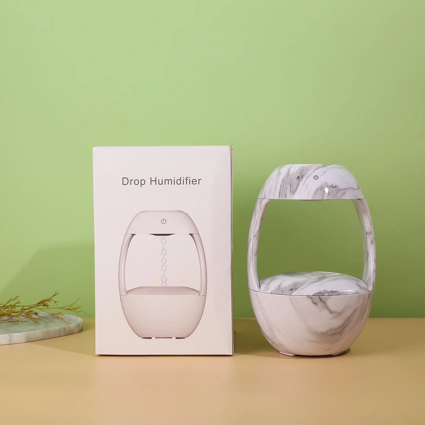 Humidificateur décoratif HUMEA avec brume anti-gravité et design en marbre